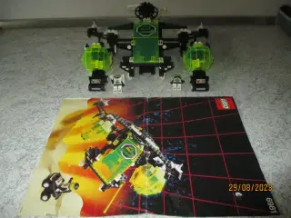 6981