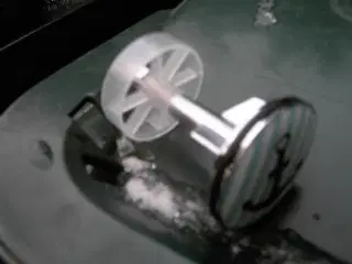 Prop, med motiv, til bundventil i håndvask