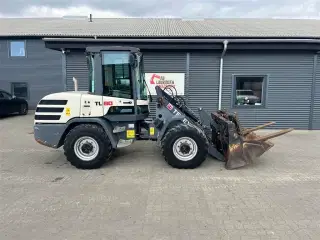 Terex TL80 4i1 skovl og pallegafler