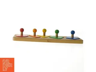Træ-puslespil med farvede former (str. 36x10 cm)