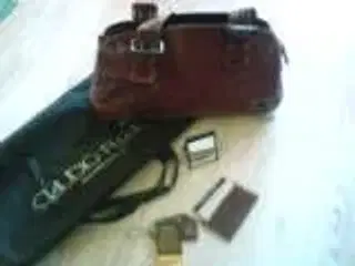 Rødt vintagelæder håndtaske