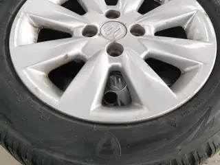Alufælge på næsten nye vinterdæk suzuki Liana 