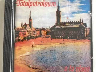 Totalpetroleum: a la plage – I UBRUDT FOLIE